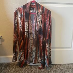 Jacket long Sleeves 90% polyester 10% spandex soft flowing material.